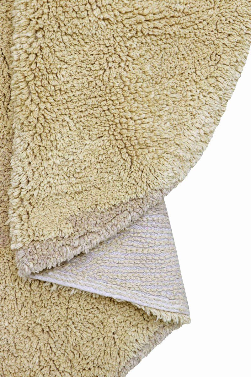 10. Close-up of teddy bear rug's underside showing RugCycled textile fibers
