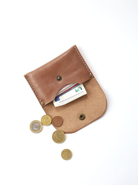 3. Open Toks Visoks WEEKEND wallet in cappuccino leather with cards and coins on white background