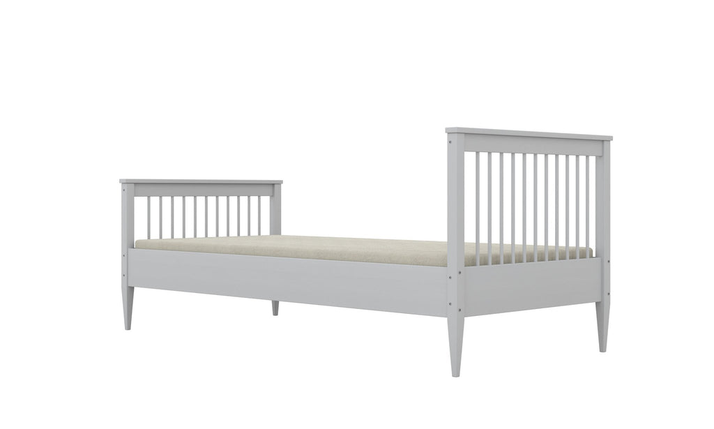 8. White wooden bed with slatted headboard and footboard in studio lighting