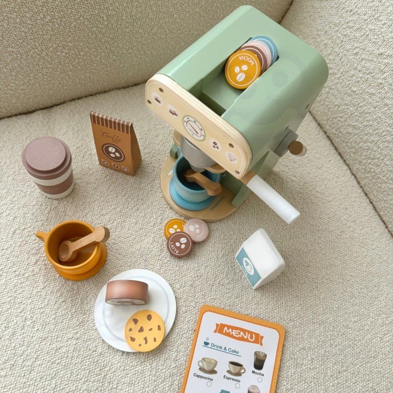 3. Top view of Woopie Green coffee machine with accessories and menu card
