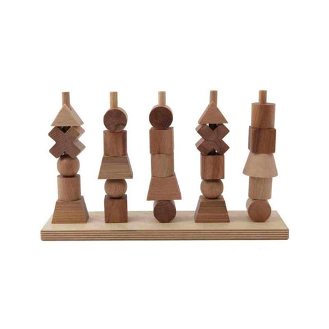 2. Wooden Fence Puzzle by Wooden Story with natural wood blocks on a wooden base, studio shot