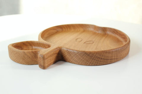 5. Wooden apple-shaped plate for kids with a focus on the side profile and smooth edges, on a white background