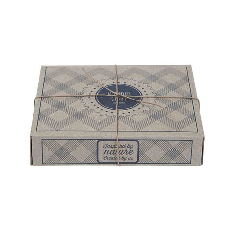 2. Eco-friendly packaging for Wooden Story koala rattle, featuring a patterned design and tied with string