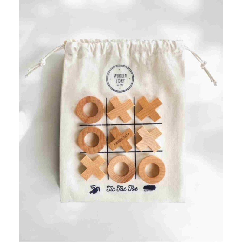 3. Close-up of cotton bag with tic-tac-toe grid and wooden X and O pieces from Wooden Story